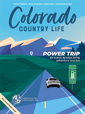 June 2025 Echoes of the Empire Cover - graphic depiction of an electric vehicle driving on a two lane road in the Colorado mountains